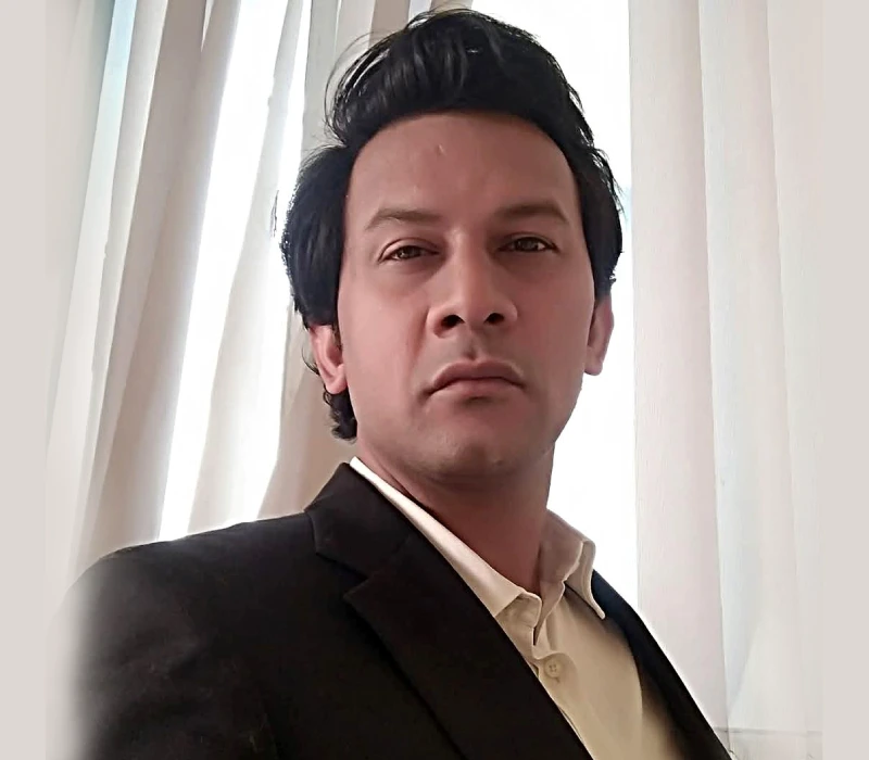 Dr Manish Jha